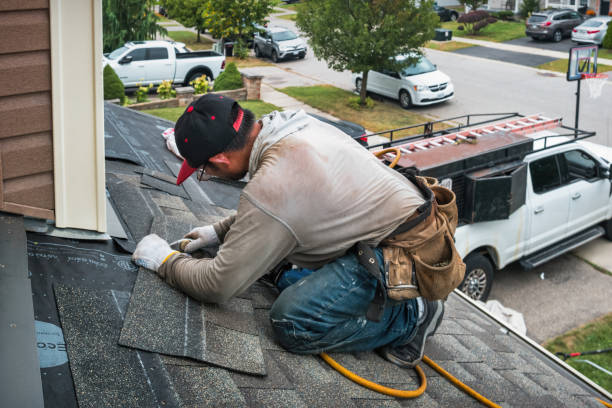Professional Roofing technician working in North Chicago, IL
